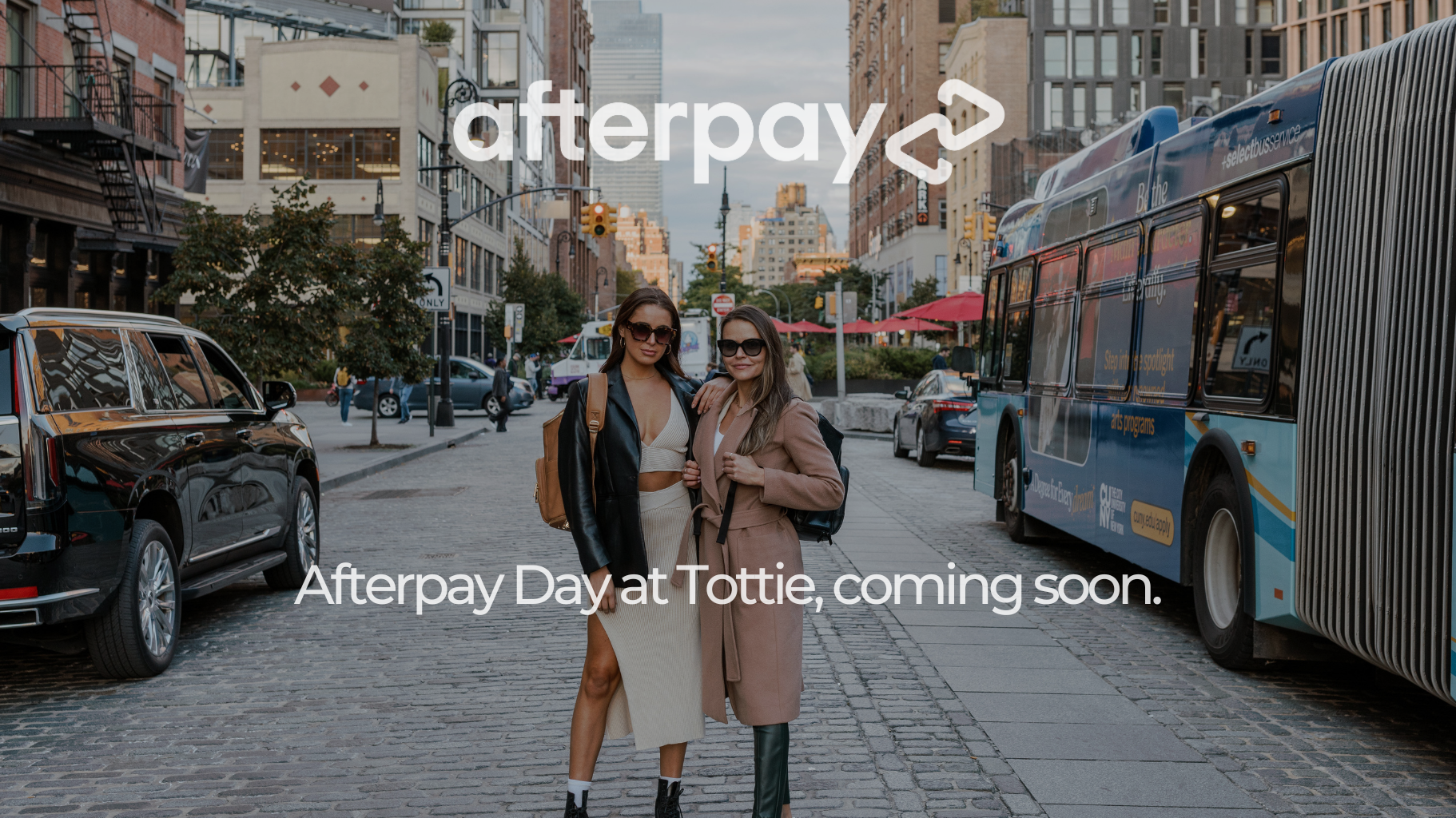 Women wearing modern work backpack with Afterpay Day text overlay.