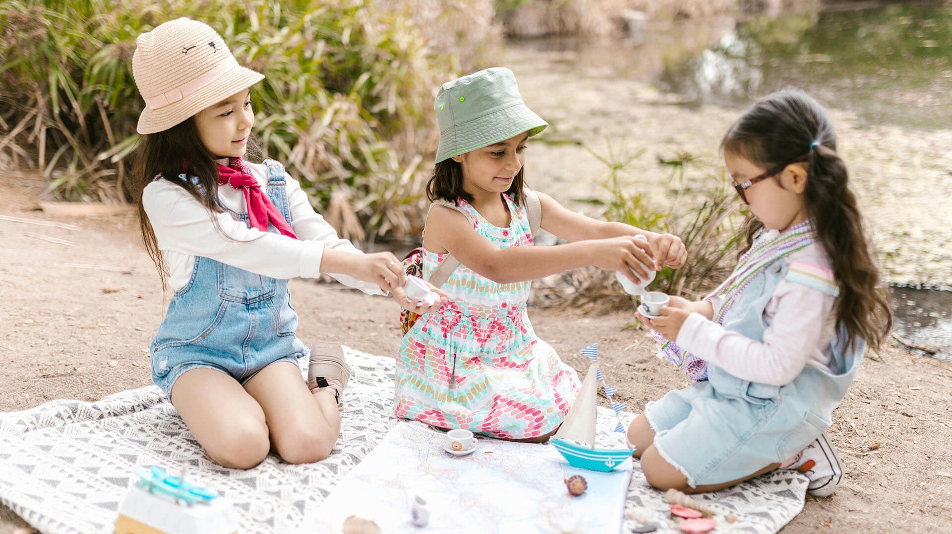 three girls engaged in fun activities during school holidays
