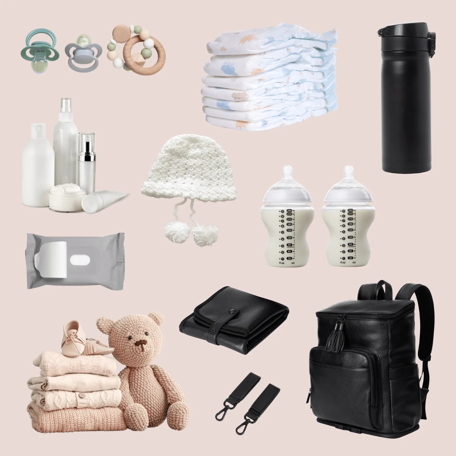 Black nappy bag backpack containing organised baby gear: black baby change mat, pram clips, baby essentials, and toys for on-the-go parents.