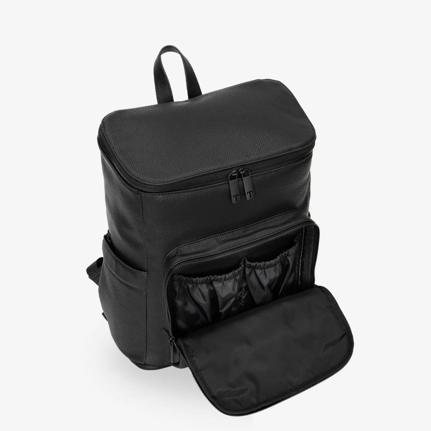 Side view of black nappy bag with one open compartment and black hardware, showing interior space.