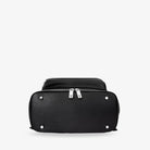 Detailed bottom view of black nappy bag backpack featuring silver hardware – reinforced for everyday use.