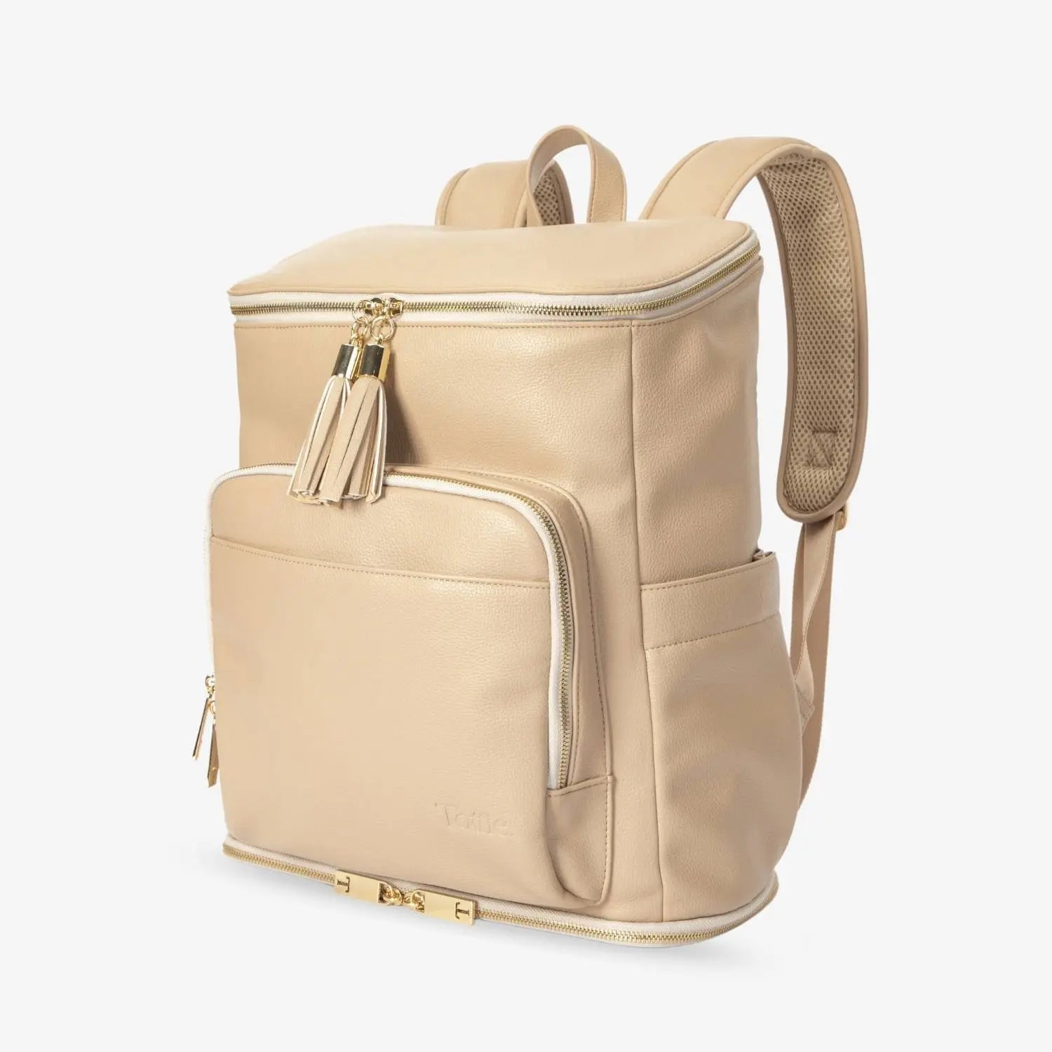 Side-angle of stone colour nappy bag backpack with gold hardware – spacious yet compact for daily outings.
