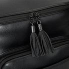 Black nappy bag backpack tassel with black hardware – elegant finishing touch close-up