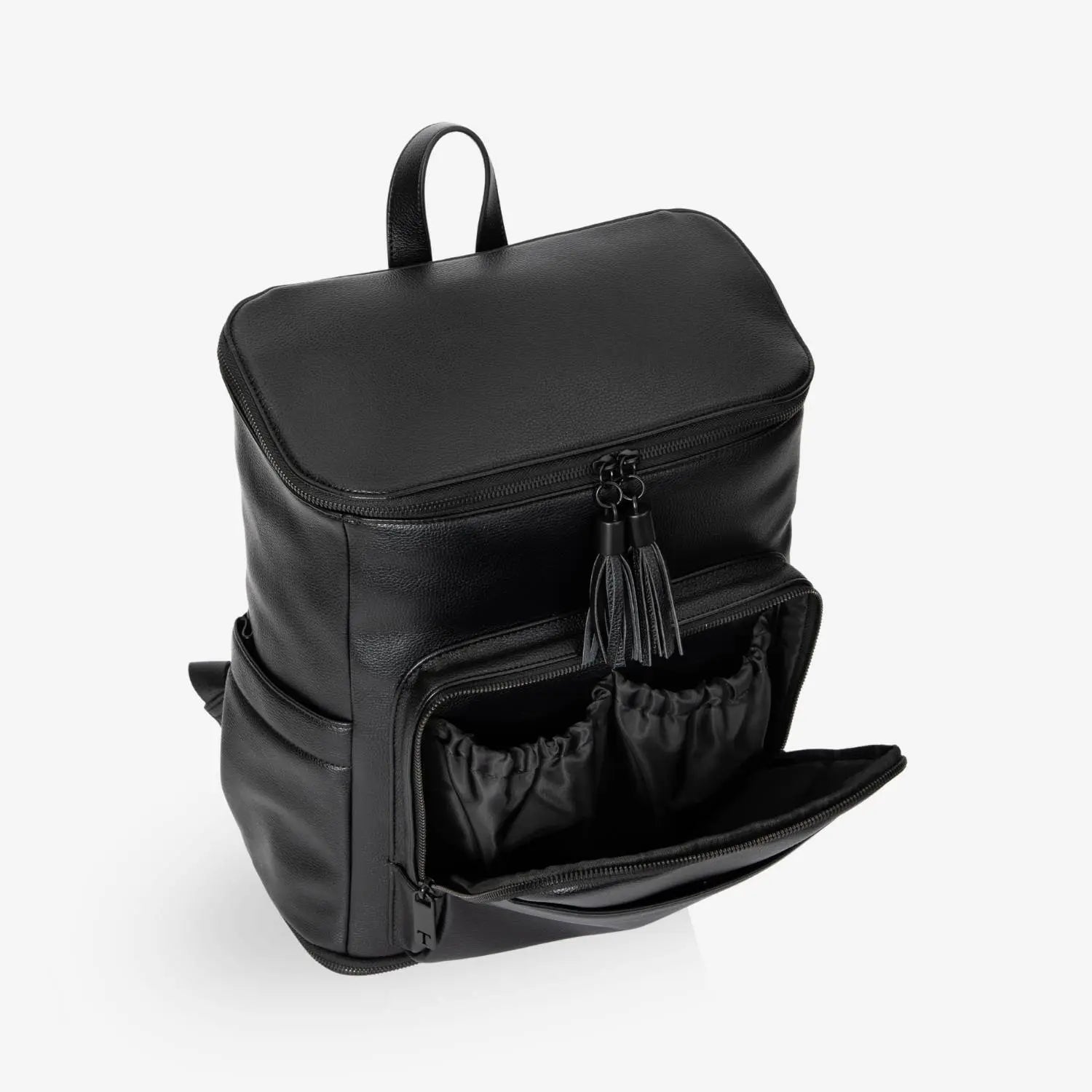 Detailed slight side view of black nappy bag backpack open compartment with black hardware.