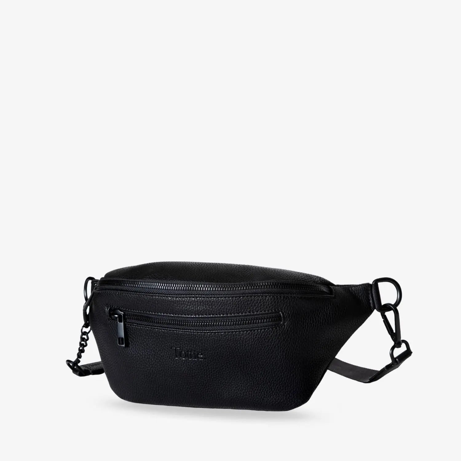 Front view of black bum bag with black hardware and embossed Tottie logo – stylish and functional for everyday use.
