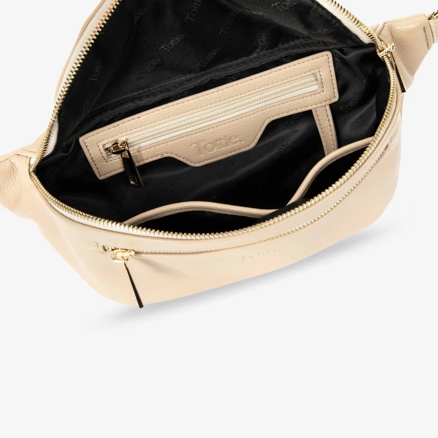 Top view of open stone bum bag with gold hardware and embossed Tottie logo inside – displayed on white background.