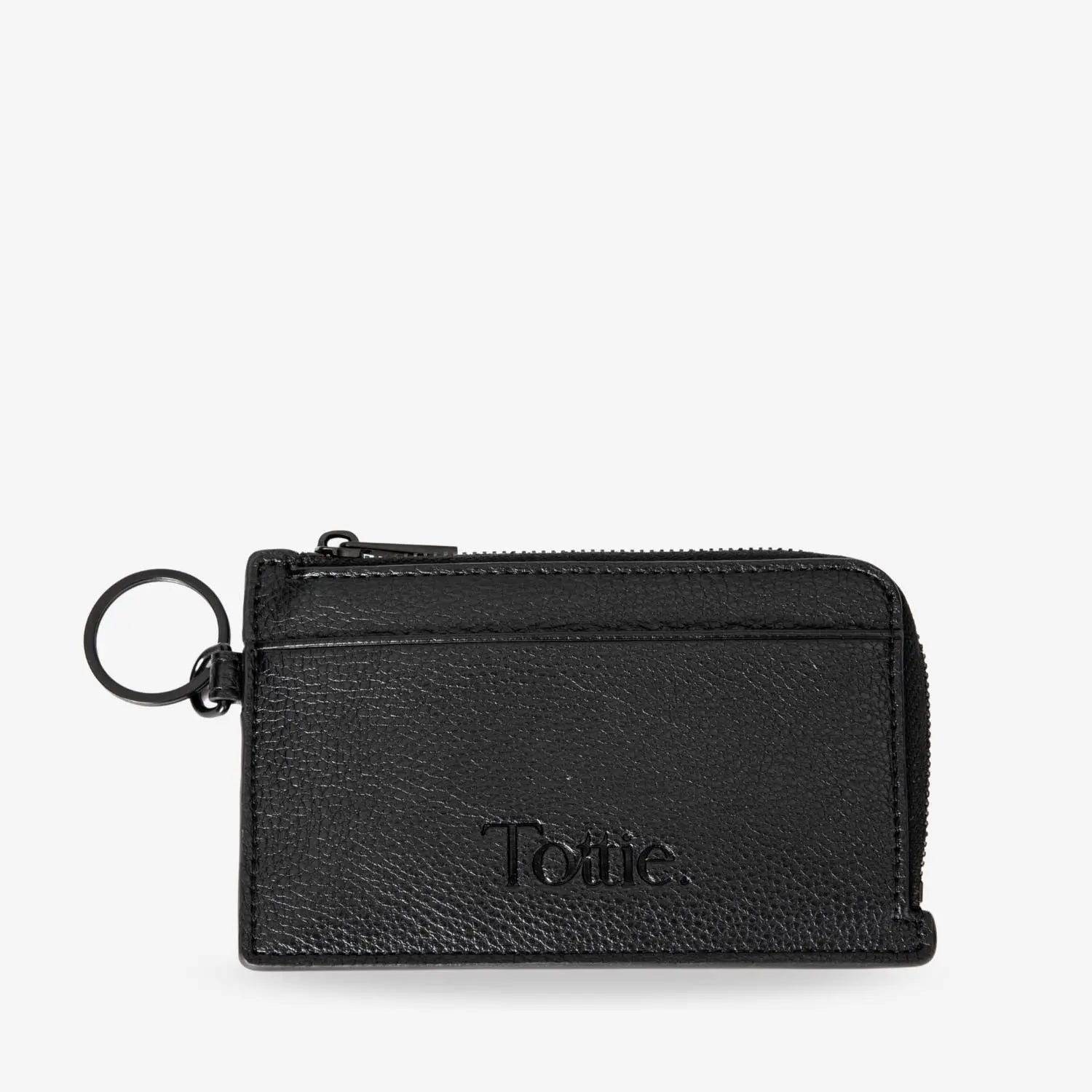 Side view of black card holder wristlet wallet with single card slot and Tottie logo embossed on front.