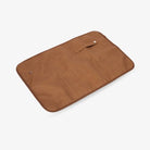 Tan change mat with gold clips shown flat on white background – compact, durable, and easy to carry.