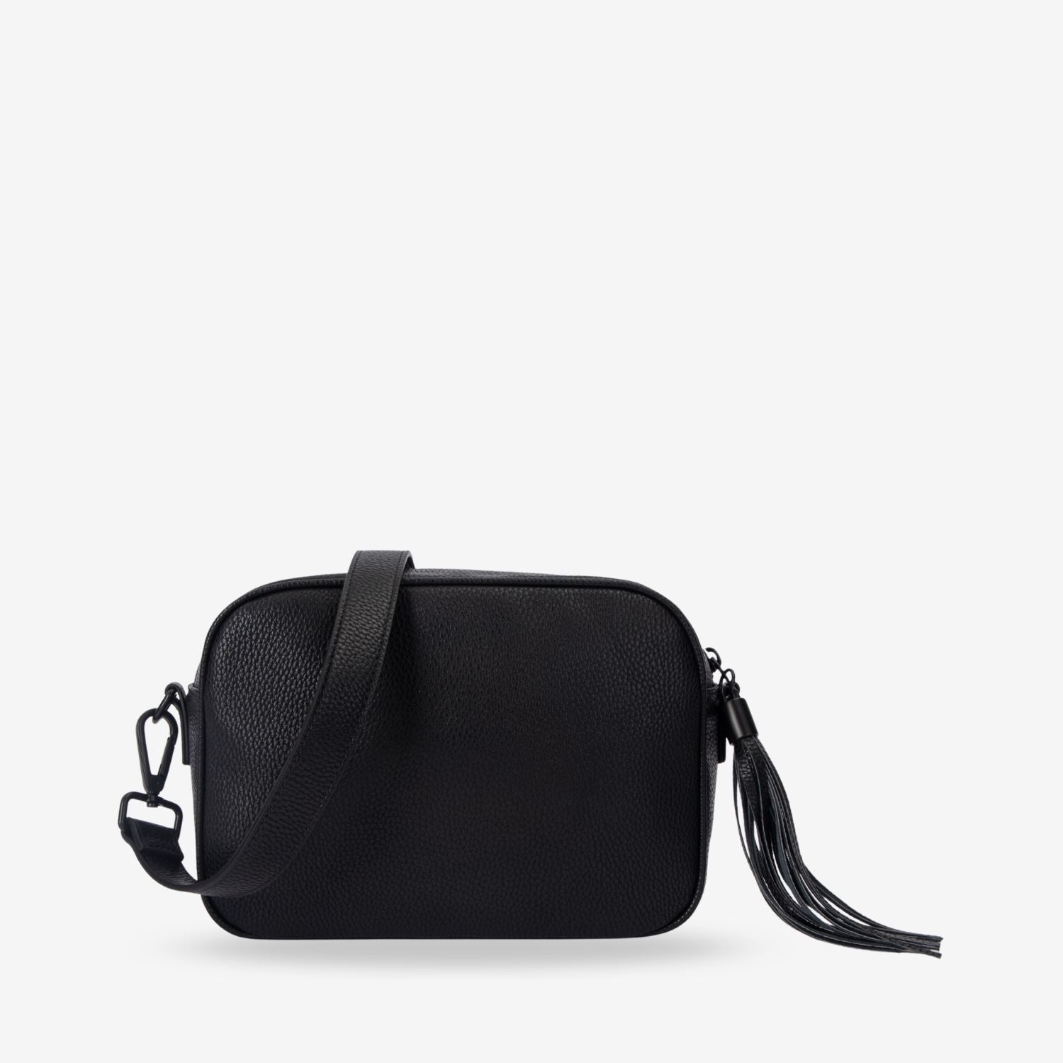 Black leather crossbody bag with a tassel on a white background