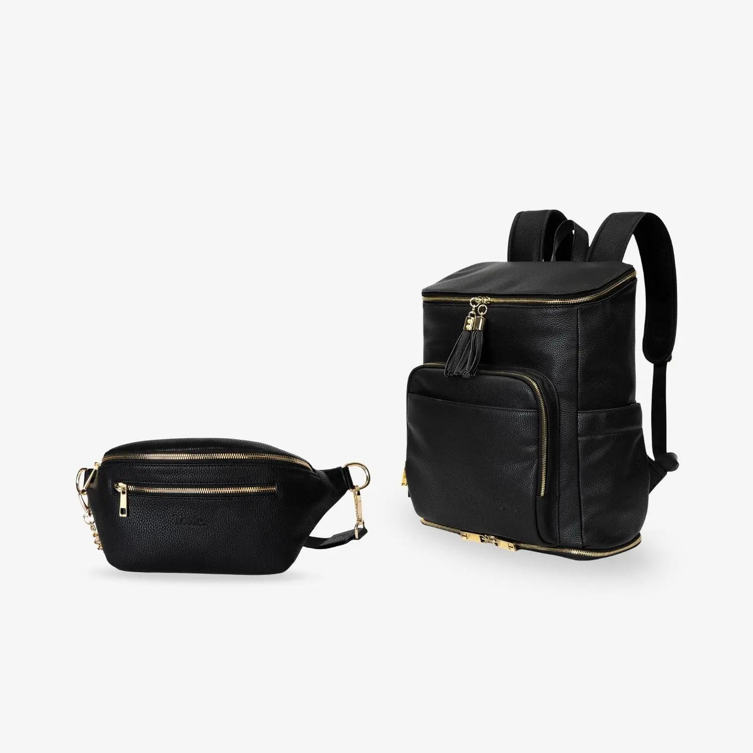 Black nappy bag backpack and black bum bag with gold hardware together as the Jet Set Bundle on plain white background