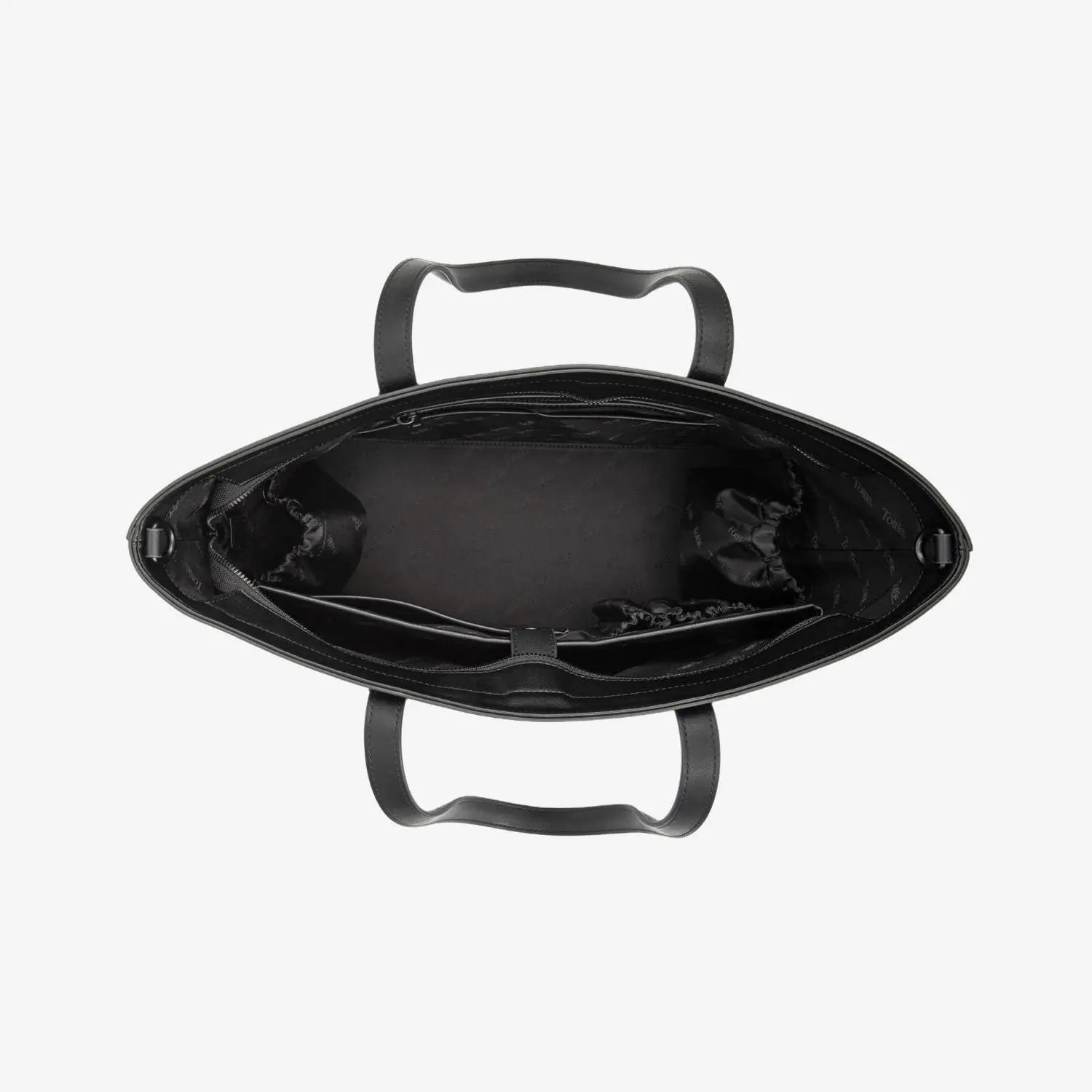 Open black tote bag seen from above, displaying roomy interior and clean black lining.
