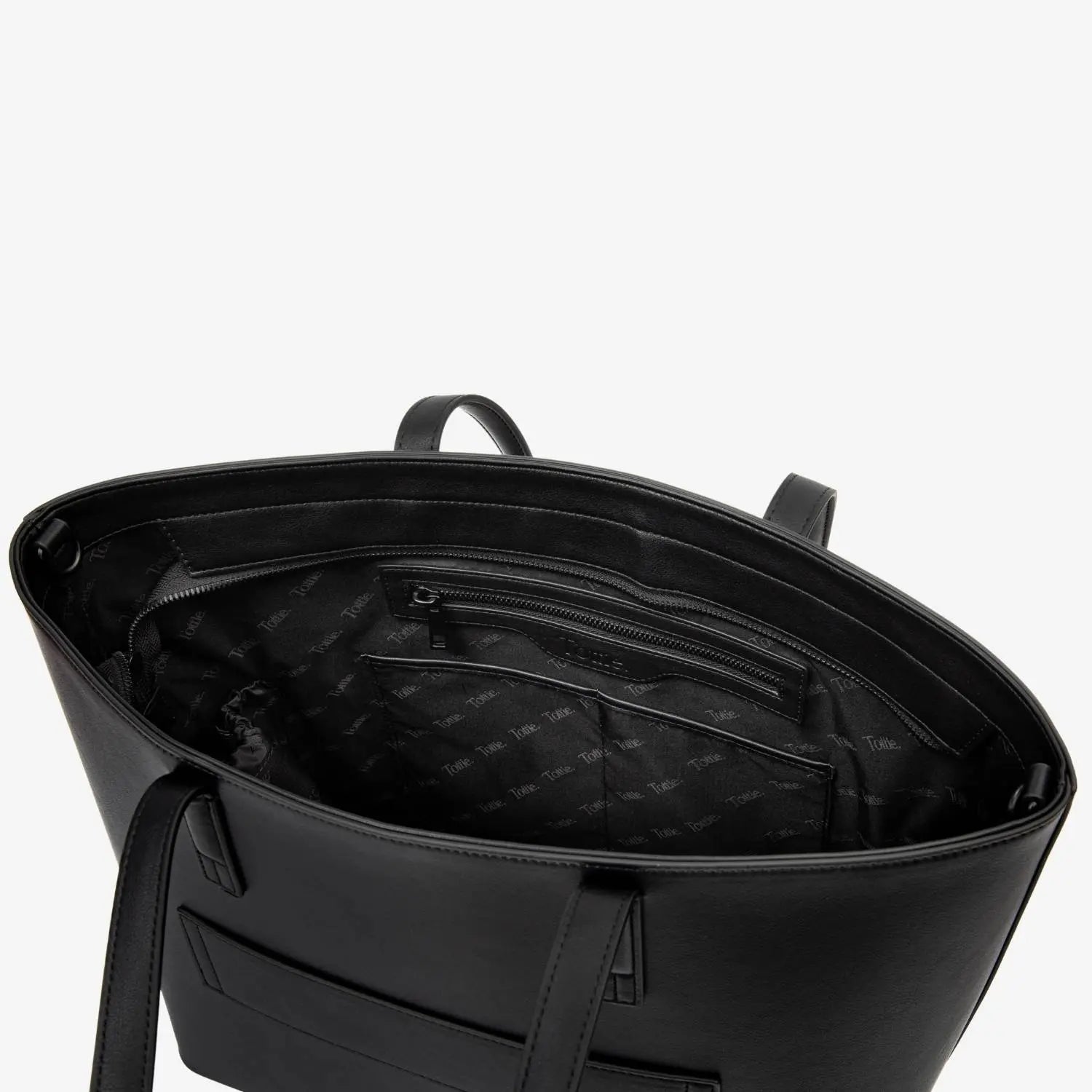 Top-down image of open black tote bag revealing multiple compartments and wide opening