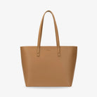 Front-facing tan colour tote bag with subtle embossed Tottie logo on display.