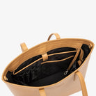 Top view of open tan colour tote bag showing spacious interior