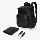 Black nappy bag backpack with matching black change mat and pram clips, all featuring black hardware – stylish and practical baby essentials.