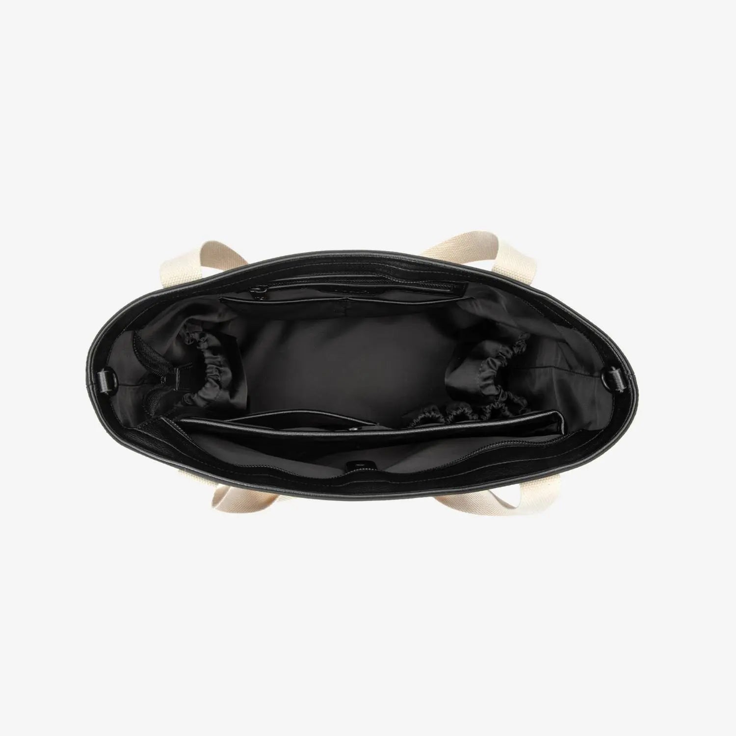 Black nylon tote bag with cream handles – overhead view on clean white background.