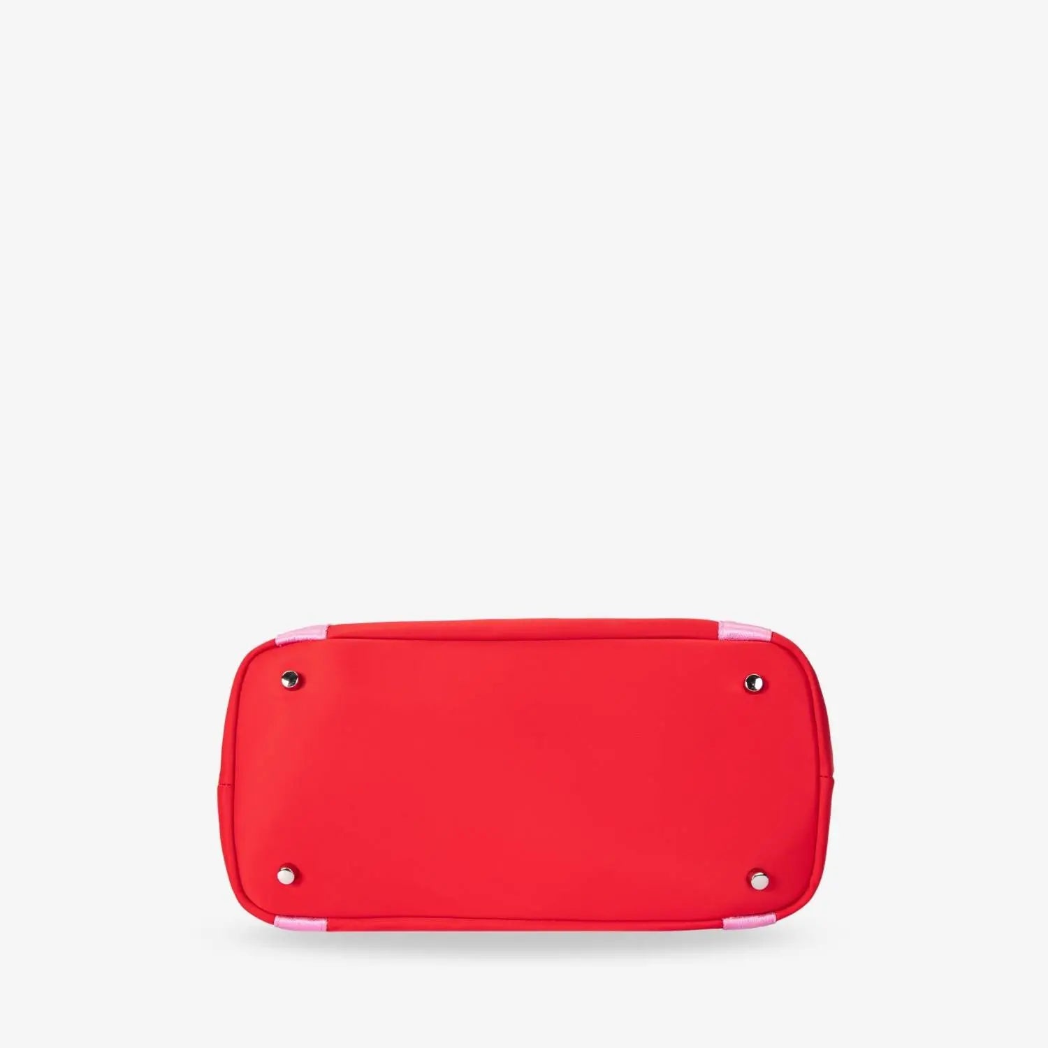 Close-up bottom view of red nylon tote bag with pink strap and WDHTFT logo embossing on white background