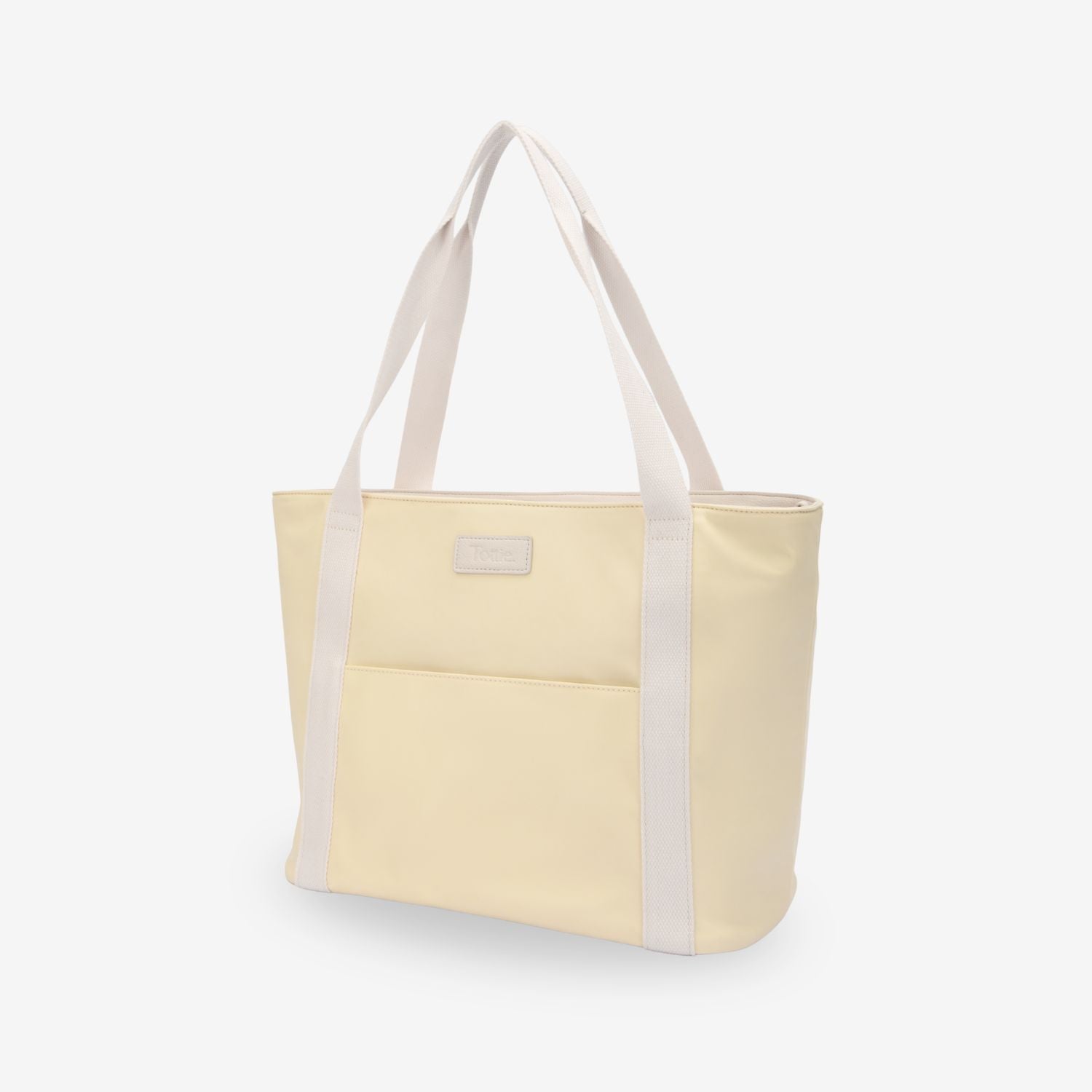 Light yellow nappy tote bag with white straps on a light gray background