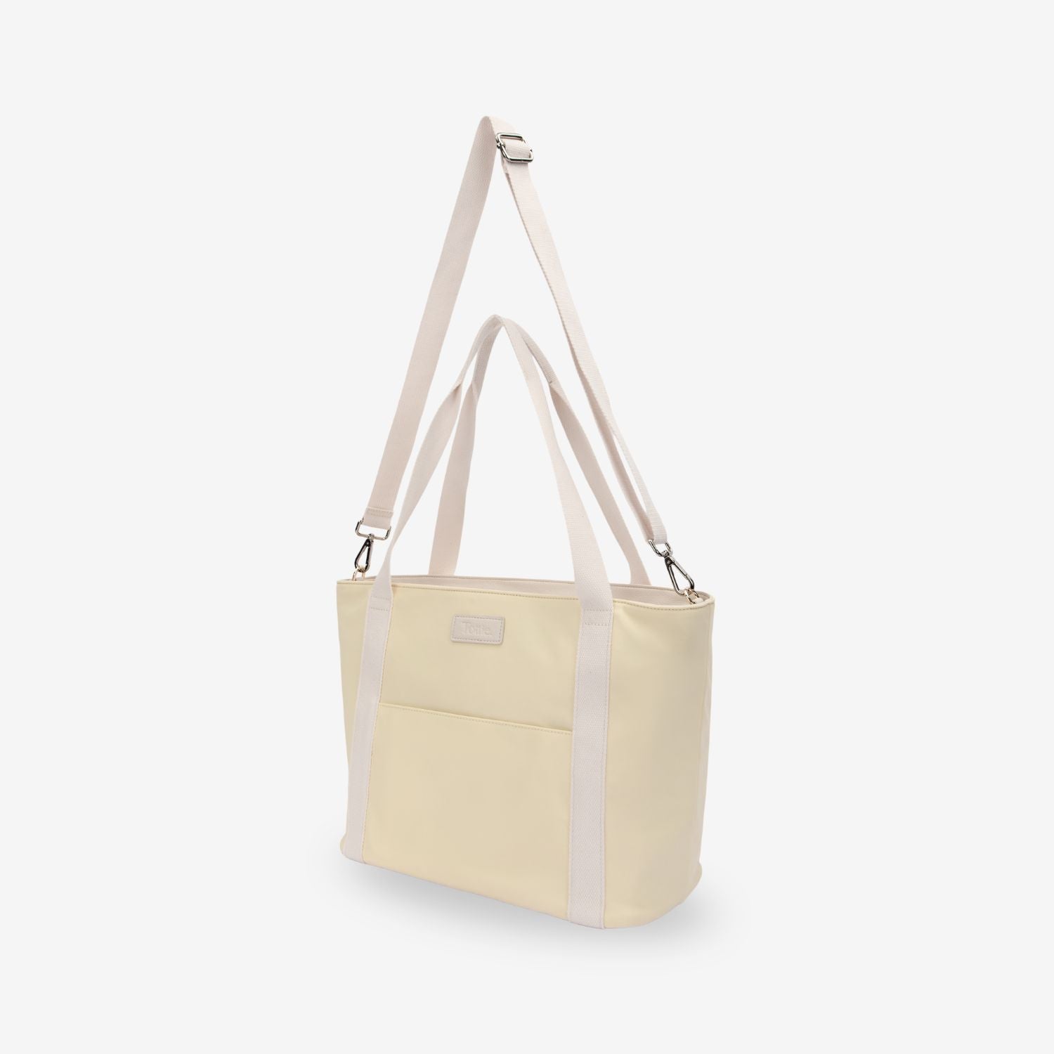 Light yellow nappy tote bag with a strap on a white background