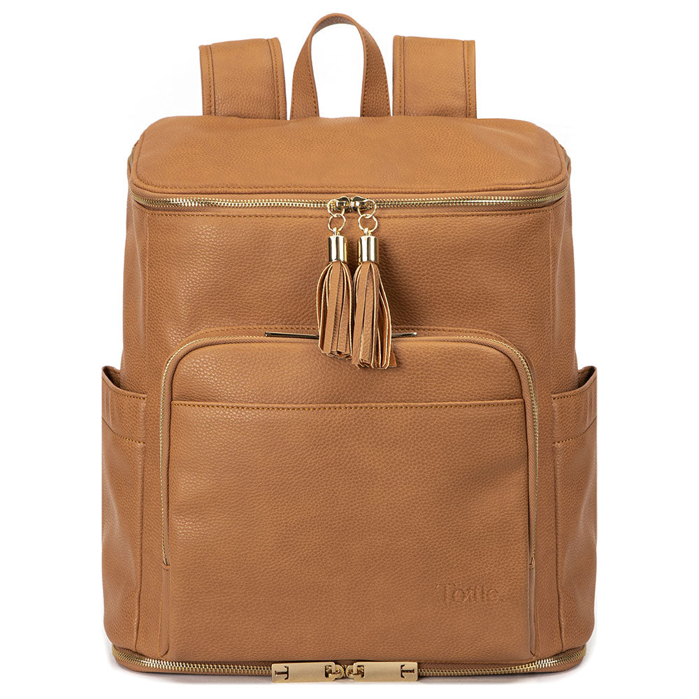 tan colored backpack with gold hardware on white background