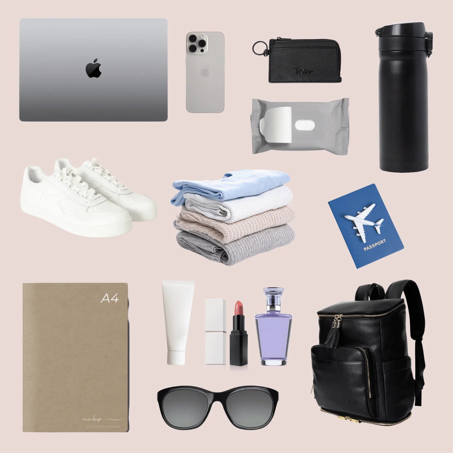 Work and travel essentials including laptop, passport, clothes, and a black backpack with gold hardware – perfect for professionals on the go.