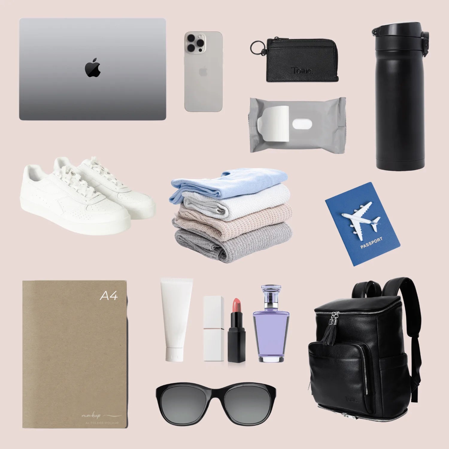 Work and travel essentials featuring tech gear, toiletries, and a black backpack with silver accents – ideal for busy professionals.