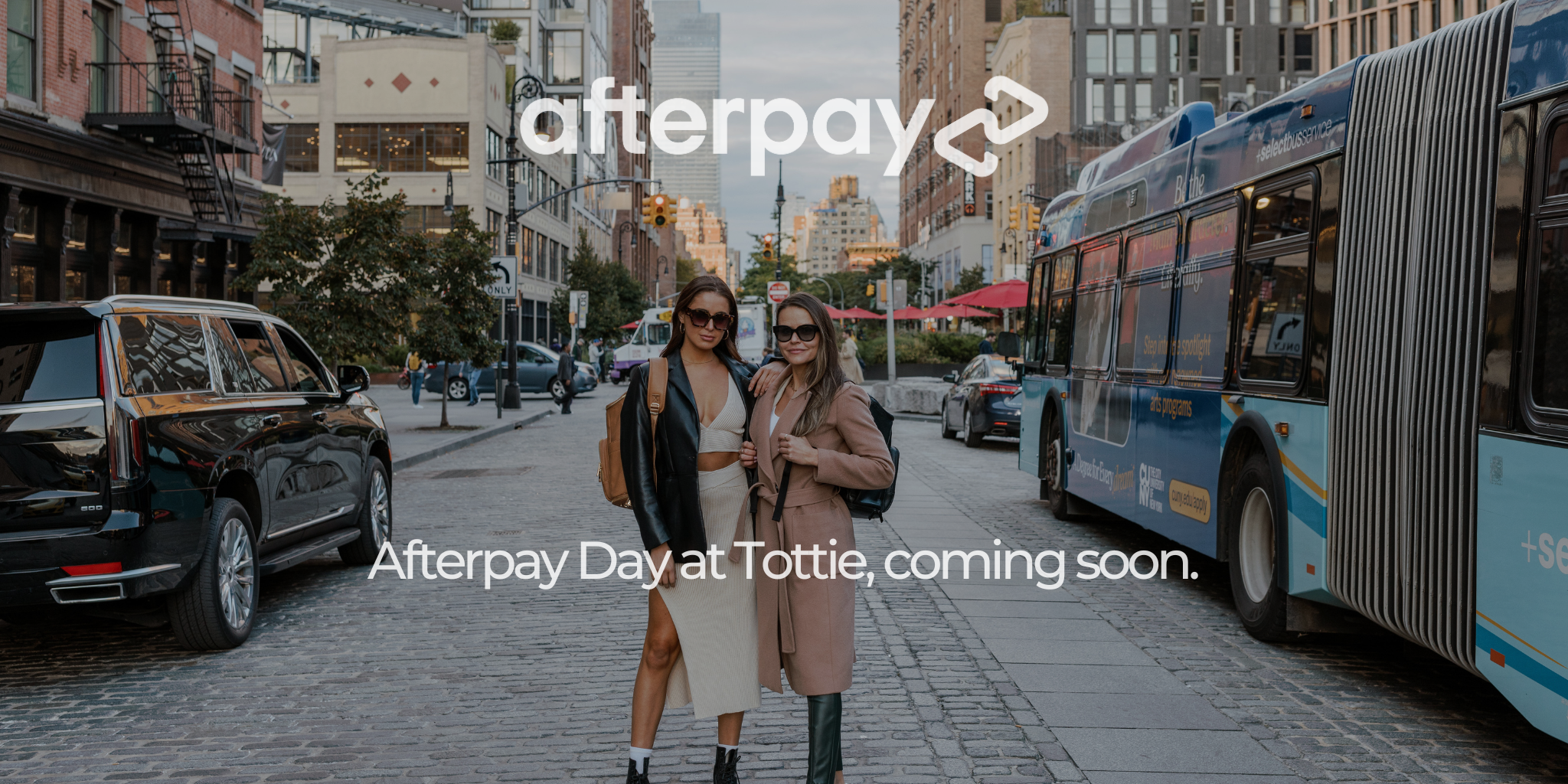 Women wearing modern work backpack with Afterpay Day text overlay.