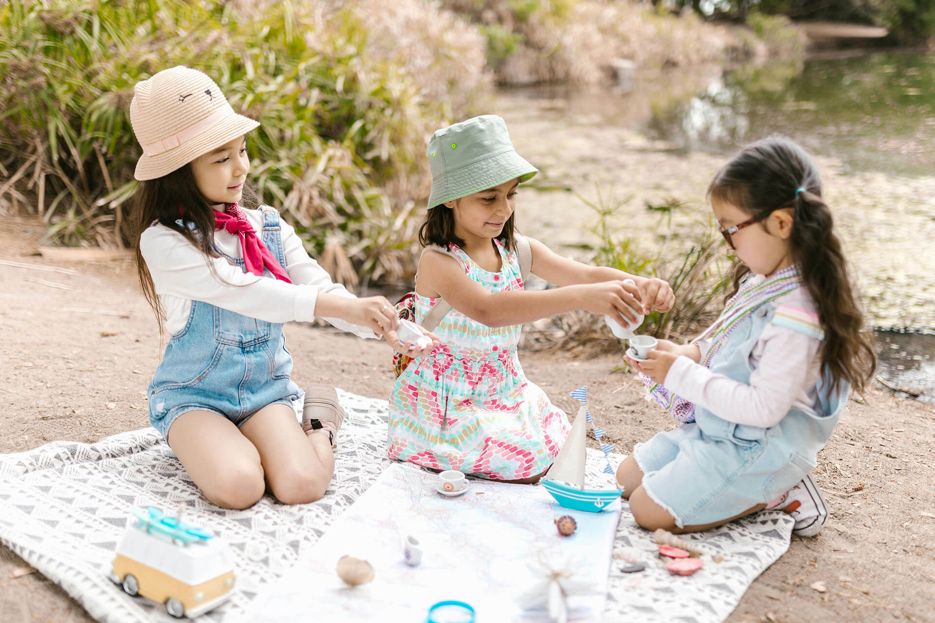 three girls engaged in fun activities during school holidays