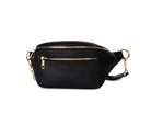 A Bum Bag in black leather with gold hardware on white background