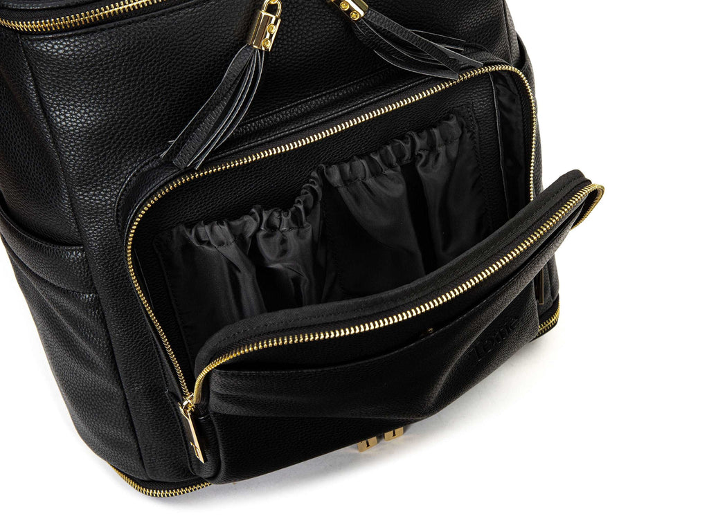 unzipped black backpack with gold hardware on white background
