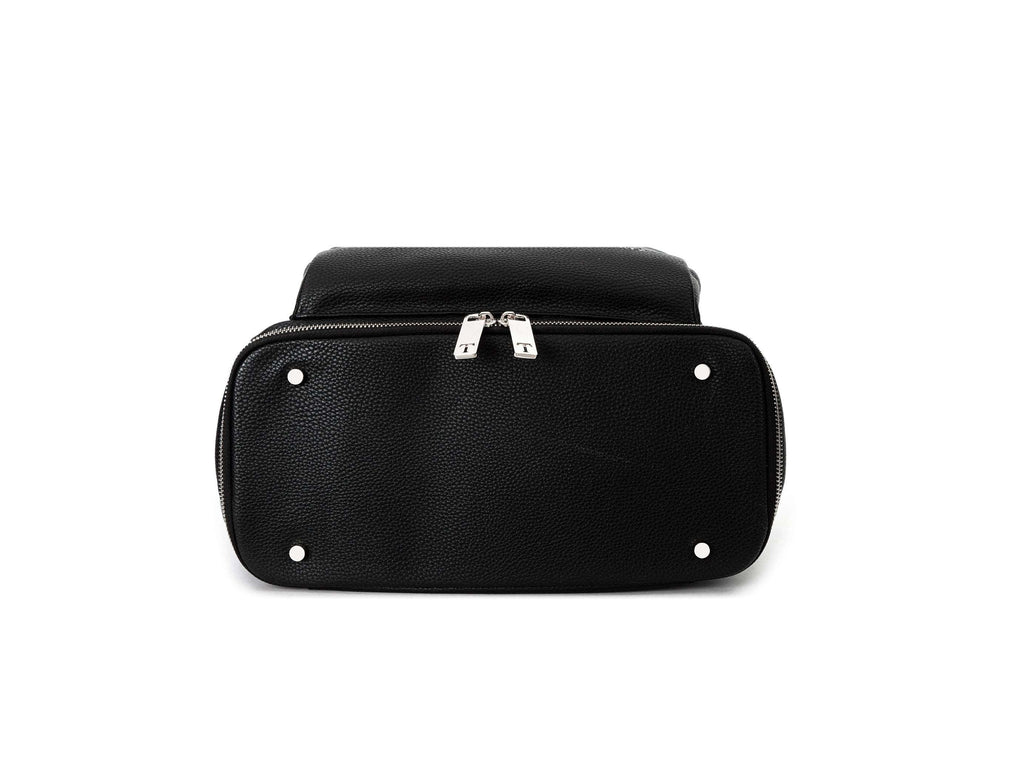 black leather bag with silver hardware on white background