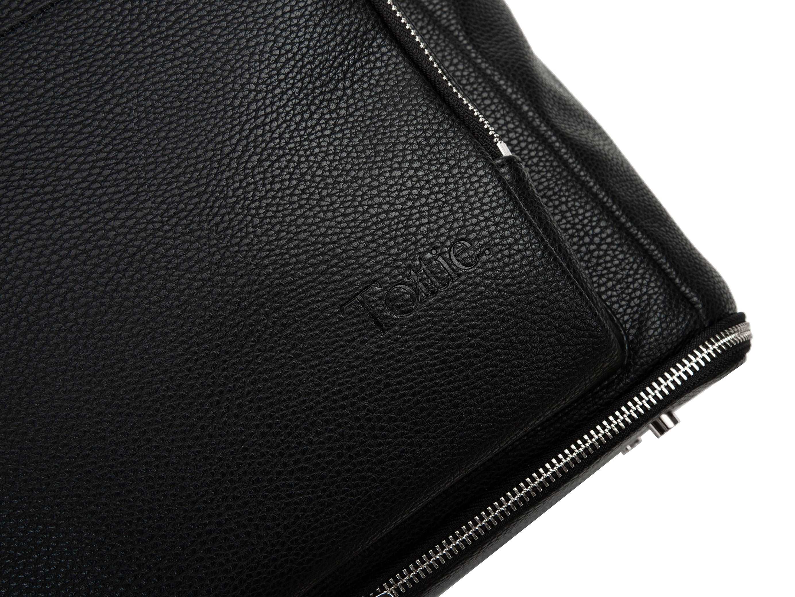 black leather bag with silver hardware on white background