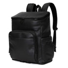 A black leather travel backpack with black zippers on white background