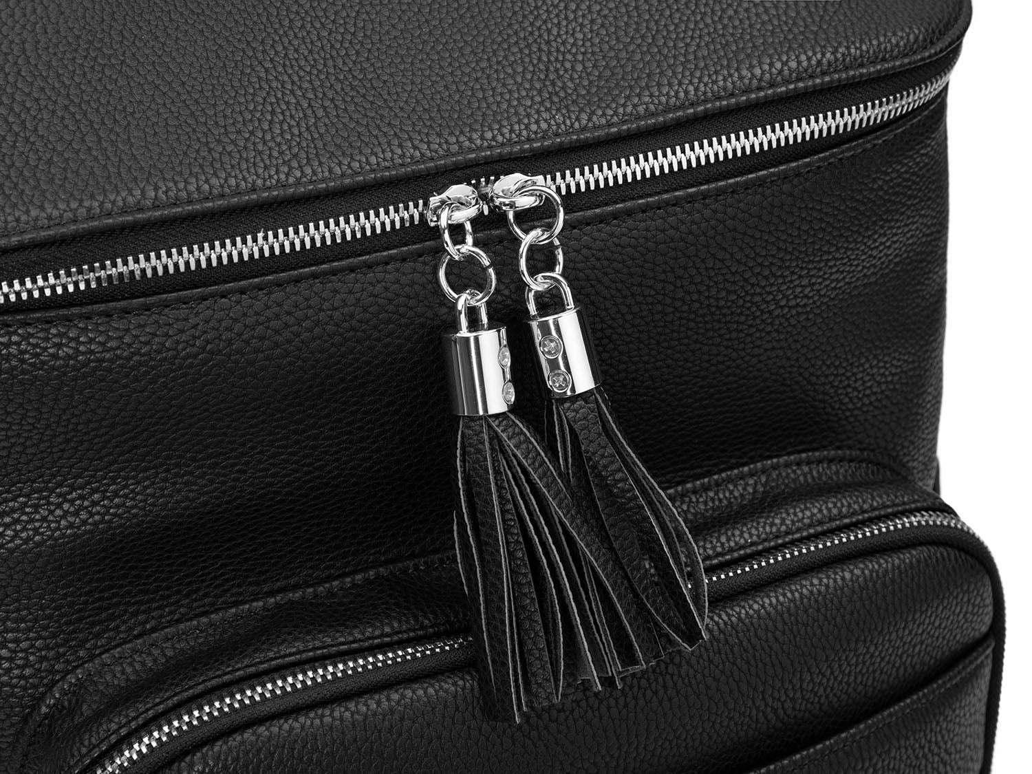 A black leather travel backpack with silver zippers