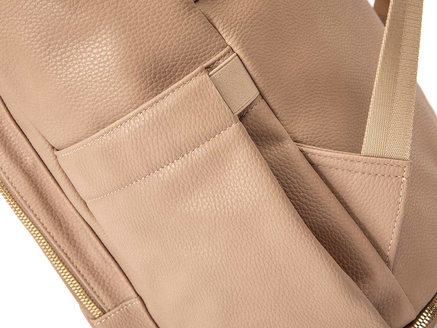 Close-up view of the vegan leather texture on a stone leather nappy backpack with a gold zipper from Tottie.