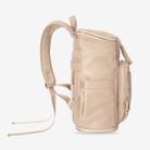 Beige travel backpack on a white background