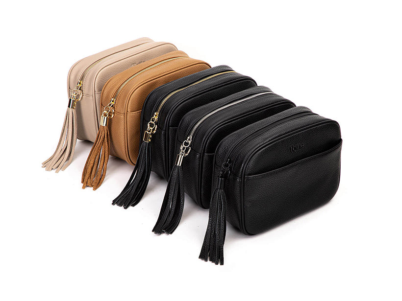 leather crossbody bags in different colors in white background