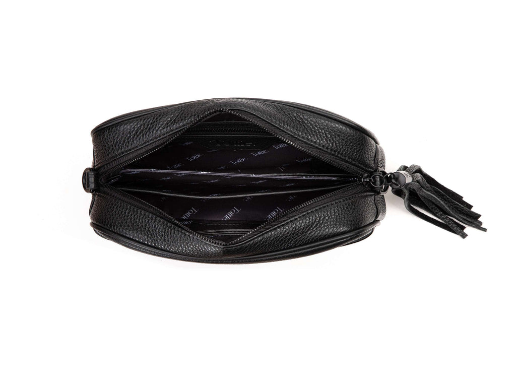 unzipped black leather crossbody bag in white background