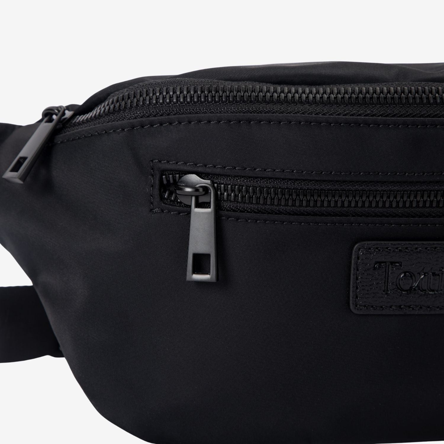 Black waist bag with zippers and a brand logo on a white background