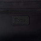 Black nylon bum bag with 'Tottie' brand logo on a black background