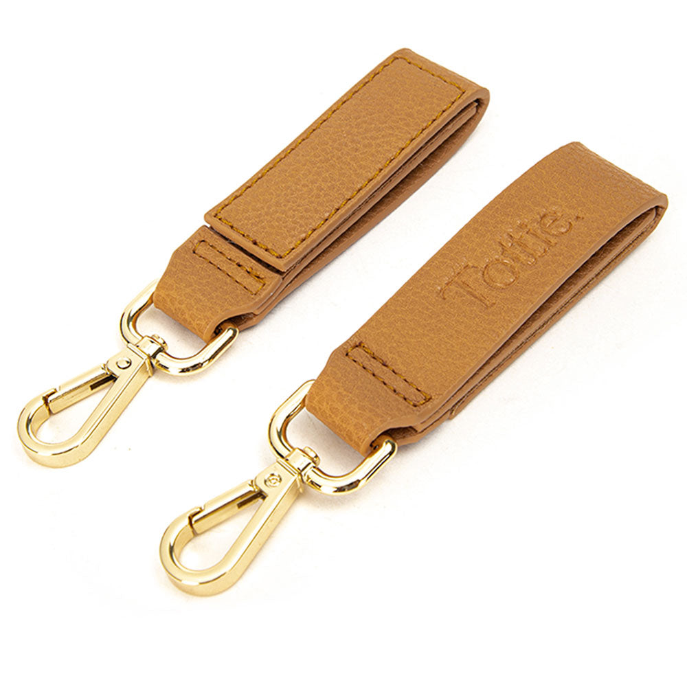 tan colour leather pram clip with gold buckle clip